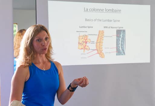 Laura talks about the lumbar spine during the Mend My Back Workshop